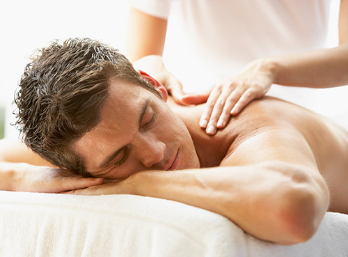 male client is taking best massage service in DHA Karachi